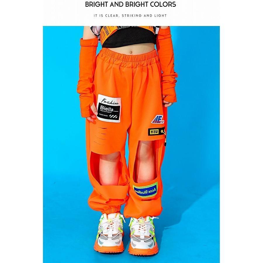 キッズダンス衣装 セットアップ ガールズ ヒップホップ 派手 へそ出し トップス パンツ K-POP 韓国 黒 オレンジ フラッグチェックの画像