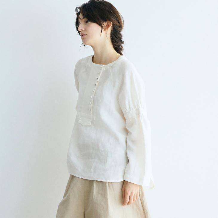 MAGALI くるみボタンのフレアブラウス MAGALI（マガリ 