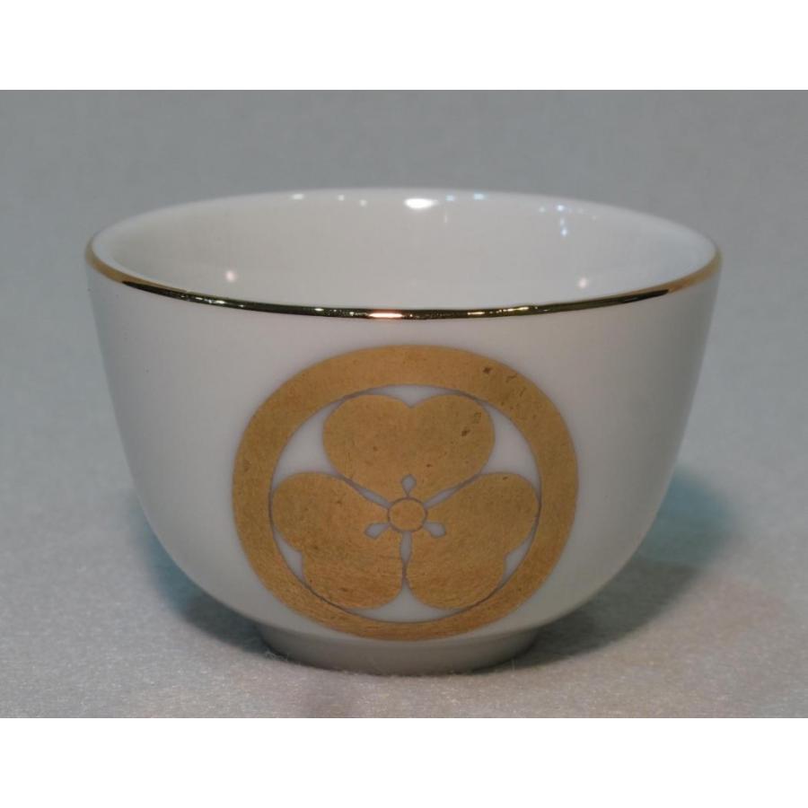 丸に片喰金焼物家紋