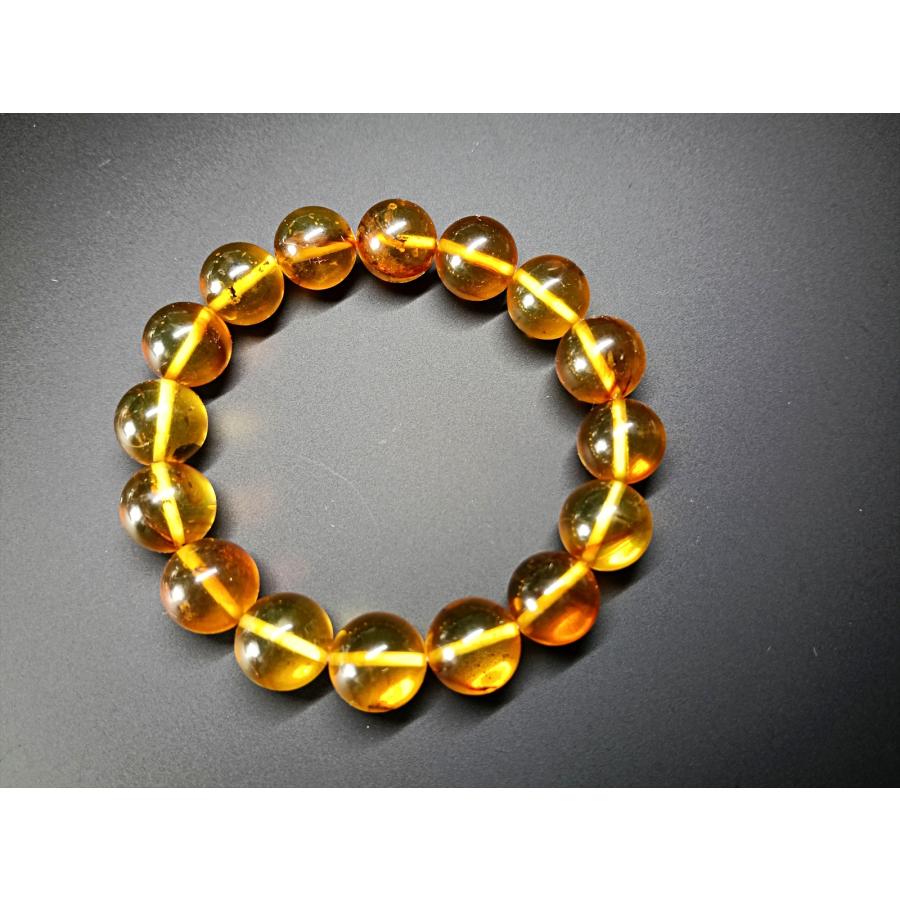 【現物写真】虫入りアンバー（琥珀）　11.5ｍｍ　内径約15ｃｍ　こだわり浄化ブレスレット　日本製オペロンゴムの画像
