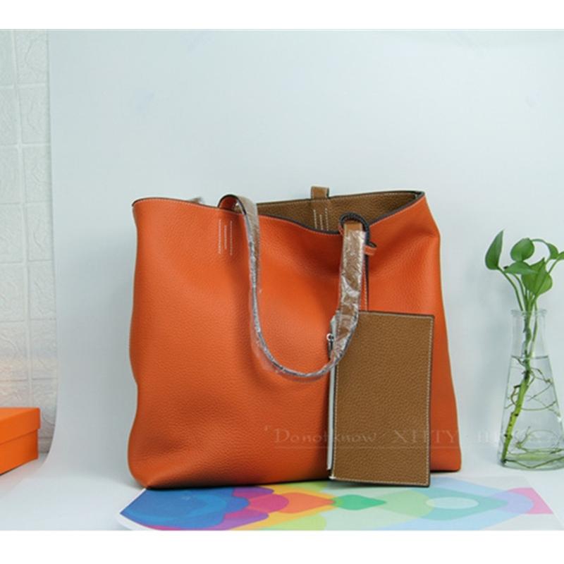 フェンディトートバッグ、おしゃれなオレンジカラー。 持ち手本革。