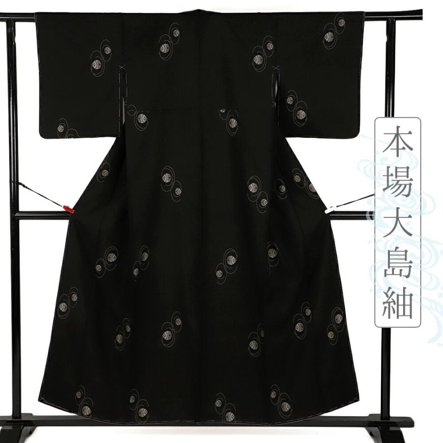 本場泥大島紬 黒地に紺椿柄 正絹 トールサイズ身丈166 裄丈67、5 未
