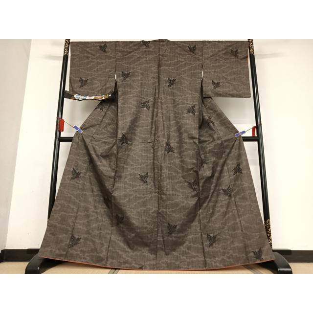 平和屋着物○本場大島紬 純泥染め 手織 一元絣 舞蝶文 川畑