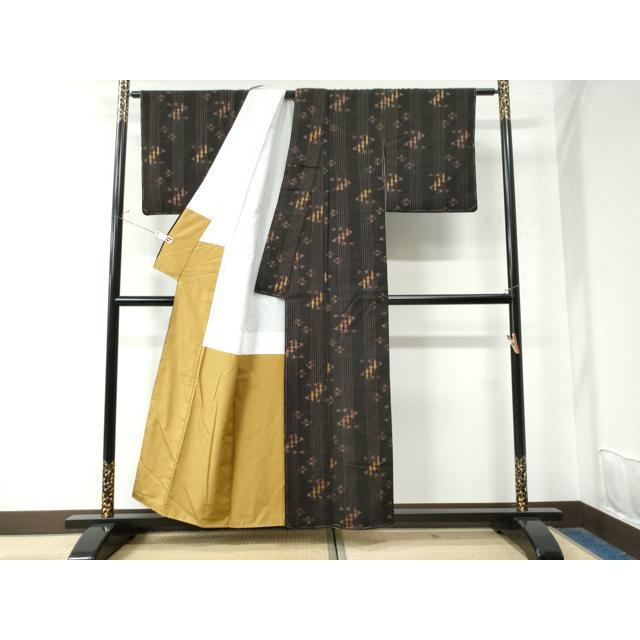 平和屋着物○国指定重要無形文化財 本場久米島紬 手織 正絹 逸品 未