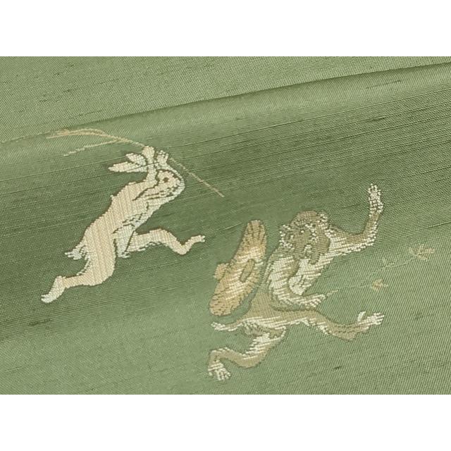 平和屋着物○極上 京の名門・菱屋六右ェ門 紬 鳥獣戯画 海松色地 逸品