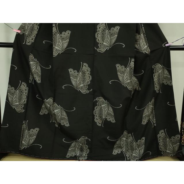 平和屋本店○極上 本場大島紬 地空 割込絣 舞蝶文 黒地 逸品 未使用 