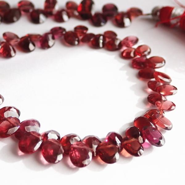 10213-《天然石　1連売り》ガーネット　カットオーバルドロップ　平均７ｘ５ｍｍ　約２０cm／１本 |  | 02