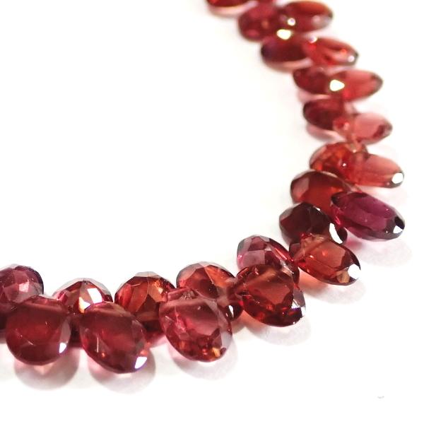 10213-《天然石　1連売り》ガーネット　カットオーバルドロップ　平均７ｘ５ｍｍ　約２０cm／１本 |  | 04