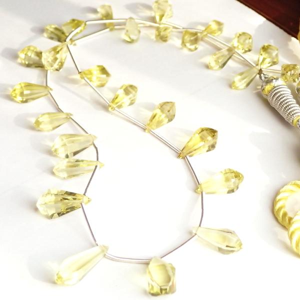 10221-《天然石　1連売り》レモンクォーツ　スクエアカットドロップ　サイズまちまち（最大２０ｘ８ｍｍ）　２８個／１本 |  | 10