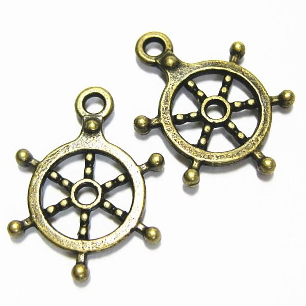 21715-《メタルチャーム・パーツ》　舵　真鍮古美　２０ｘ１５mm　１０個/１セット | 