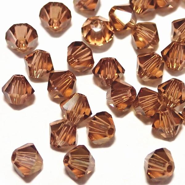 2252-SB4ＬＳＴ-ＣＨＡ スワロフスキー ４mmソロバン ライトスモーキートパーズ・シャンパン　25個/1パック | 