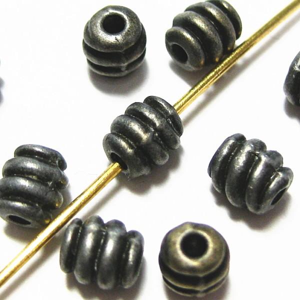 3406-《メタルチャーム・パーツ》　ビーズ　真鍮古美　５x４．５mm　約５０個/１セット | 