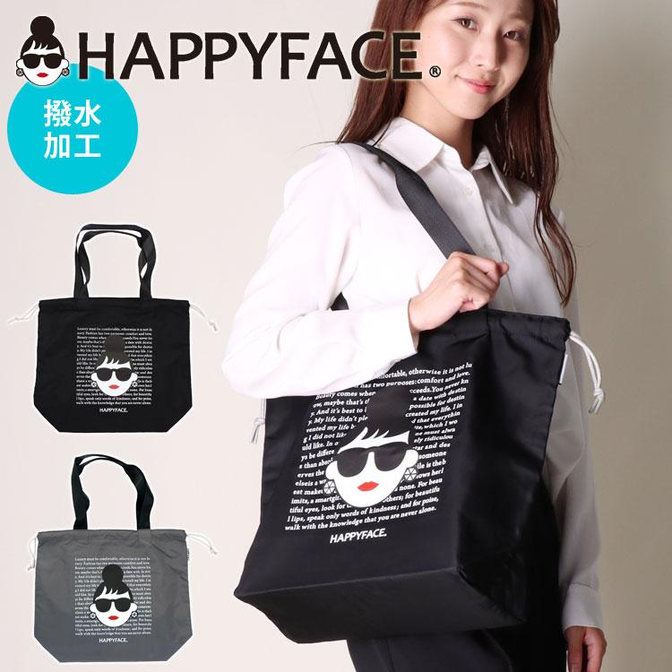 トートバッグ HAPPY FACE EMMA 英字背景 プリント 巾着 お顔