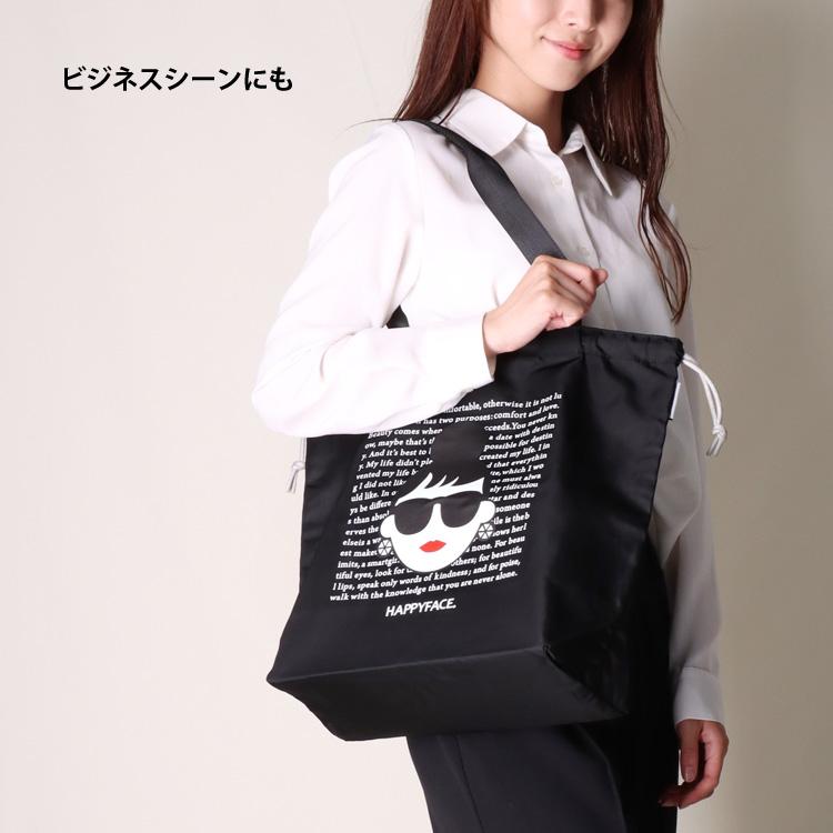 トートバッグ HAPPY FACE EMMA 英字背景 プリント 巾着 お顔
