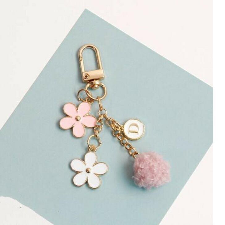 ストラップ 小花と春色ポンポンのイニシャルチャーム付きストラップ 20