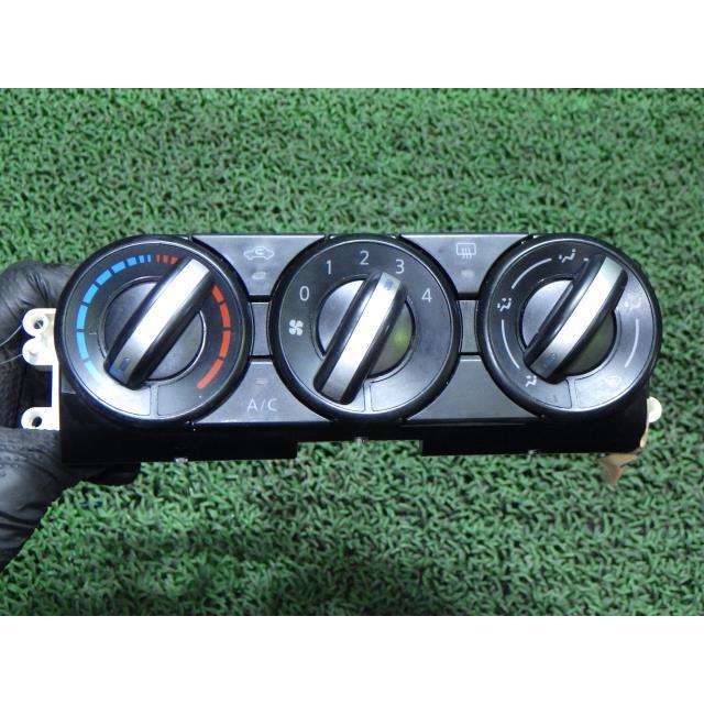 日産 NISSAN エクストレイル NT31 エアコンコントロールパネル エアコンコントロールスイッチ ハザードスイッチ エクストレイル DBA-T31 エアコンスイッチパネル 27510-JG00B 中古