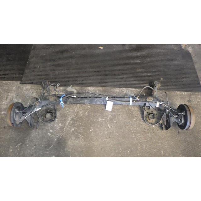 ヴィッツ DBA-NSP130 リアアクスルホーシングASSY 42101-52212 中古