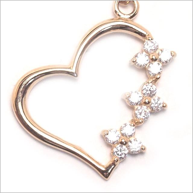 へそピアス 14K 14金 14G トリプルCZフラワーハート バナナバーベル ボディピアス へそピアス 耳ピアスの画像