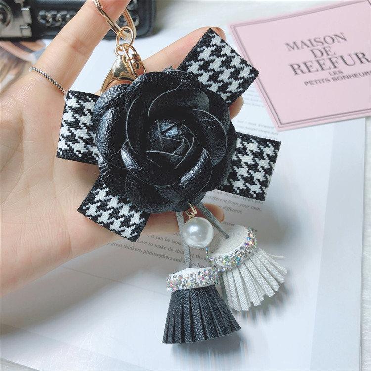 椿 リボン レディース バッグチャーム 花 フリンジ ビーズ パール 布