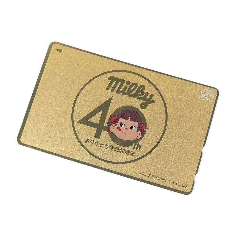ペコちゃん　テレフォンカード テレホンカード ペコちゃん 50度 不二家 ミルキー発売40周年記念