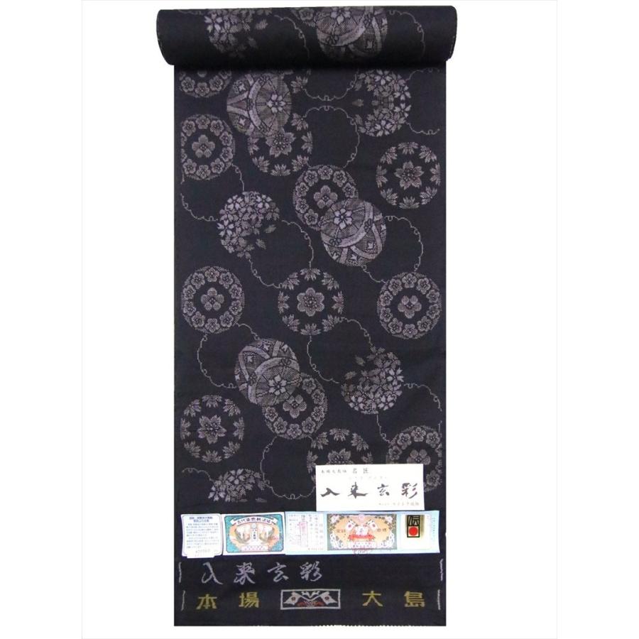 証紙あり】鹿児島県本場大島紬 純泥染 黒地 グレーの雪輪に華模様と