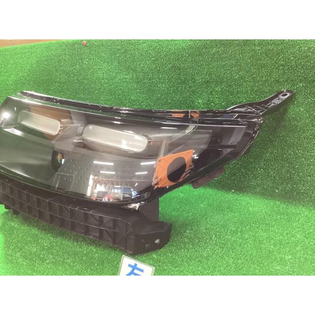 フリード 6AA-GT7 左ヘッドランプASSY E:HEVエアー EX 4WD NH830Mの画像