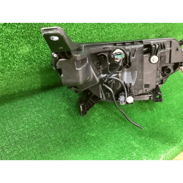 フリード 6AA-GT7 左ヘッドランプASSY E:HEVエアー EX 4WD NH830Mの画像