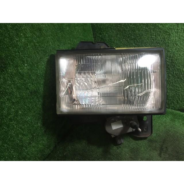 ビッグホーン(イスズ) E-UBS25GW 右ヘッドランプ ライト 737 79304