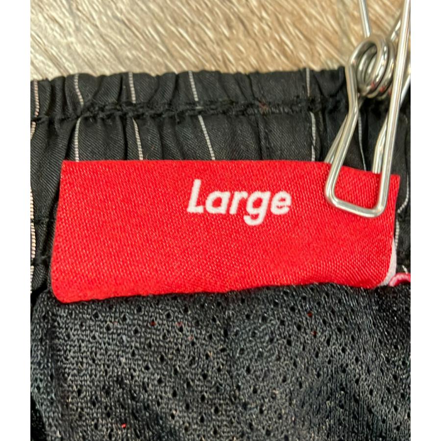シュプリーム トラックパンツ reflective pinstripe track pant メンズ