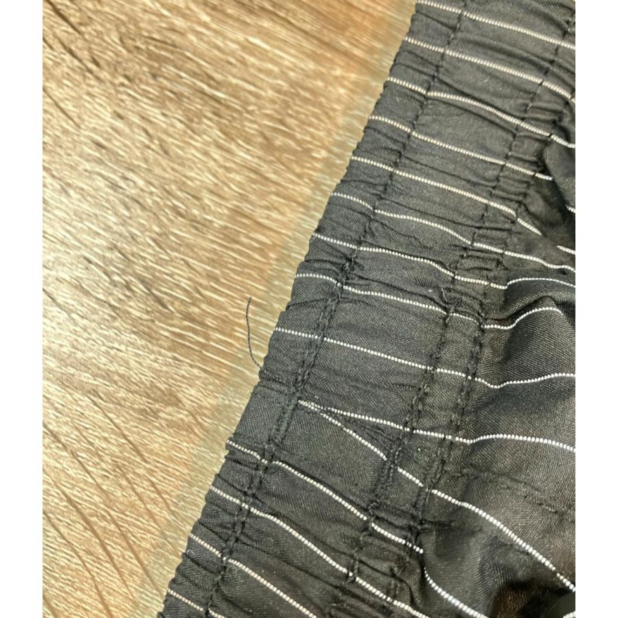シュプリーム トラックパンツ reflective pinstripe track pant メンズ