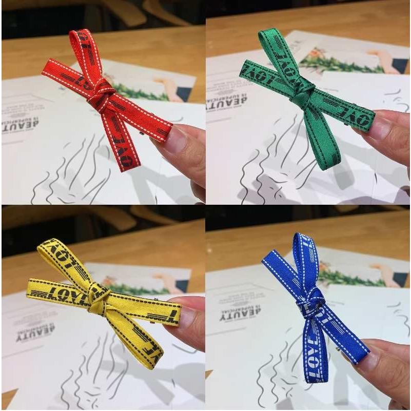 送料無料 テープ リボン ヘアクリップロゴ 文字入り 赤 黄色 クリップ