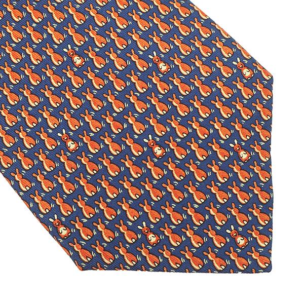 エルメス HERMES ネクタイ ラビット 9cm シルク ネイビー×オレンジ 紺 ウサギ うさぎ  【箱】【中古】 HERMES（エルメス） ネクタイ ラビット 9cm シルク オレンジ 紺 ウサギ