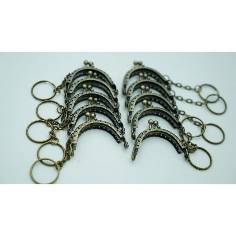 0495 ミニ がま口 口金 ハンドメイド 手芸 金属 パーツ ブロンズ 幅約5cm 10個セット 資材 手作り 材料 素材 作製 財布 丸形 裁縫 ゲンコ 縫い付けタイプ |  | 01