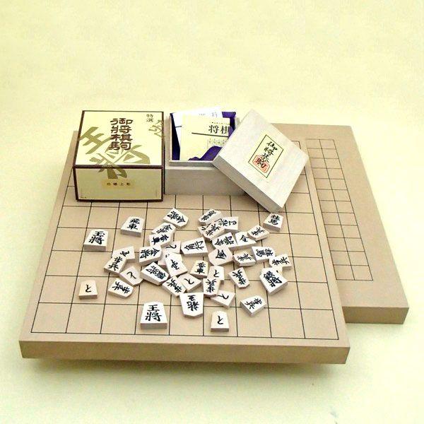 木製棋仕かける 新桂10号卓上13路両用盤と円錐小体天童の棋駒白椿上彫
