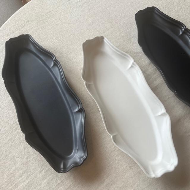 臼杵焼 輪花オーバル長皿 黒 2枚組 約29cmx12cm USUKIYAKI 輪花オーバル長皿 – 臼杵焼オンラインストア