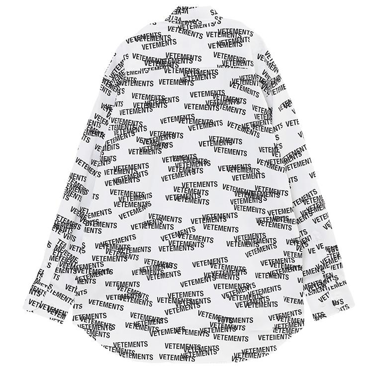 VETEMENTS ロゴプリント シャツ オーバーサイズ VETEMENTS（ヴェトモン） オールオーバー スタンプロゴ オーバーサイズ