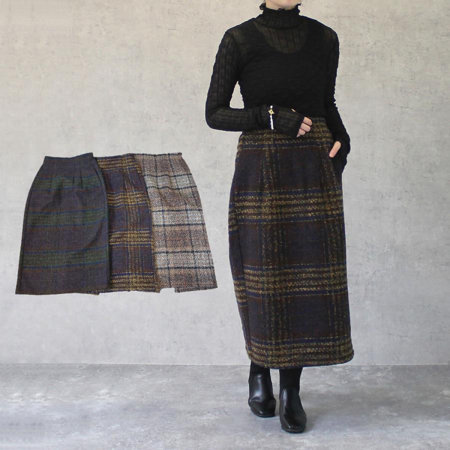 落ち着いたトーンにポイントカラーがあしらわれたリングチェックタイトスカート | 