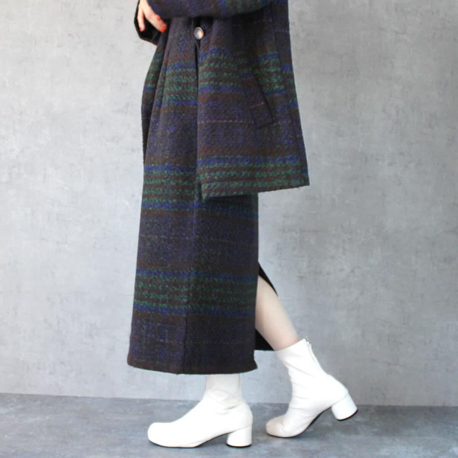 落ち着いたトーンにポイントカラーがあしらわれたリングチェックタイトスカート |  | 14