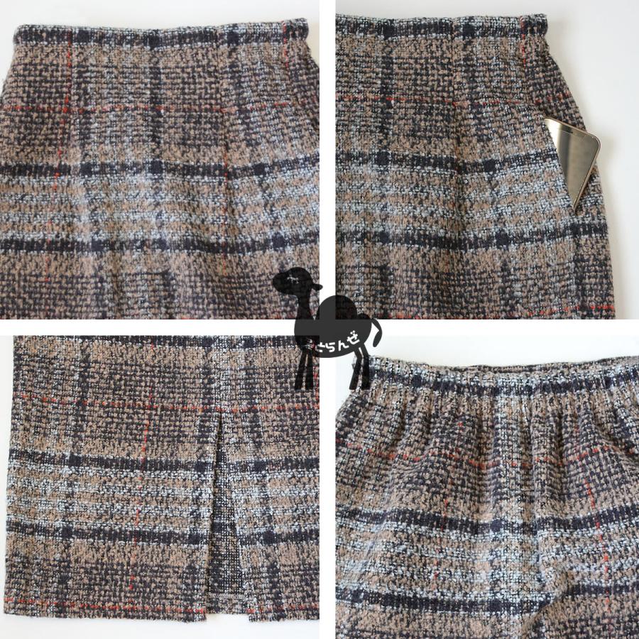 落ち着いたトーンにポイントカラーがあしらわれたリングチェックタイトスカート |  | 17