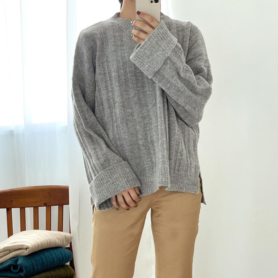 袖先と裾元は幅広めのリブデザインでゆったり感の中にルーズ過ぎないクルーネックウールセーター |  | 11