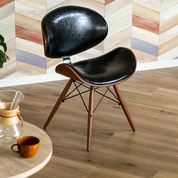 アームチェア　ビンテージチェア　レザーチェア　　　モダンデザイン デンマークデザイン レザー張りのアームチェア 丸い背もたれにアーチの