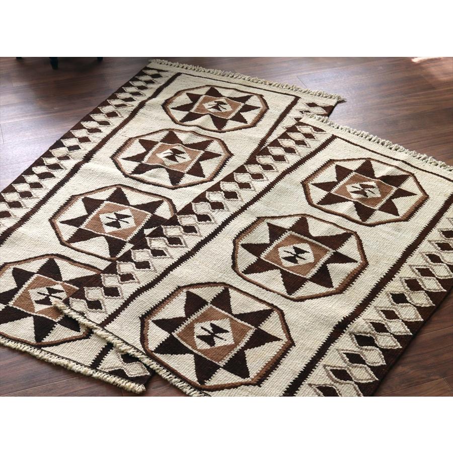 トルコの手織りキリム カルス 130x86cm メダリオンと幾何学モチーフ |  | 06