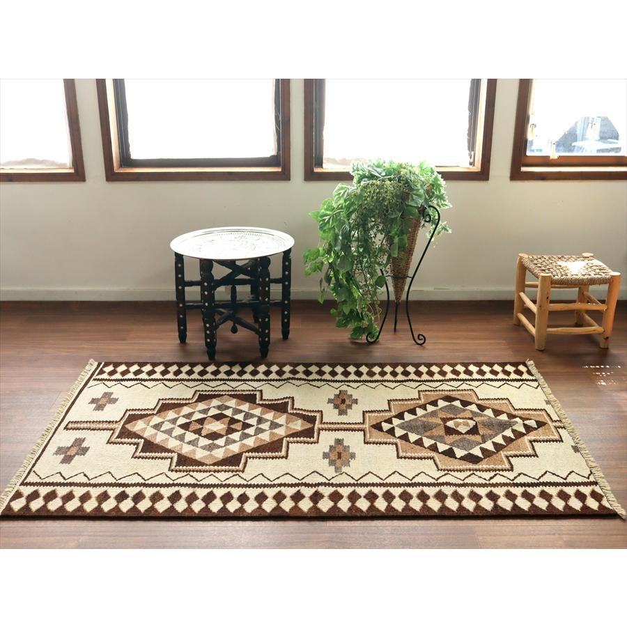 トルコの手織りキリム カルス 167x96cm メダリオンと幾何学モチーフ |  | 01