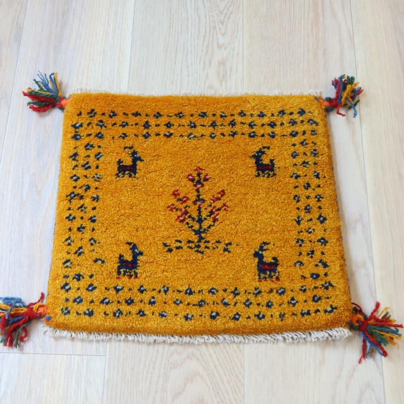 ギャッベ イラン産手織り 座布団サイズ 37x41cm イエローオレンジ　草花と動物モチーフ | ブランド登録なし
