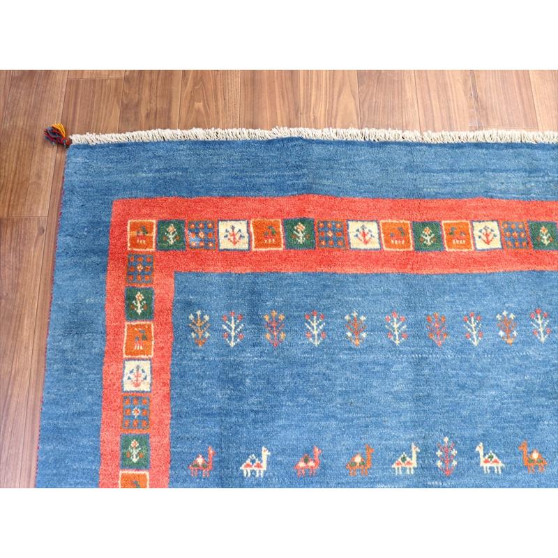 ギャッベ 明るいブルー　 233x172cm 動物と駱駝のモチーフ　レッドボーダー |  | 07