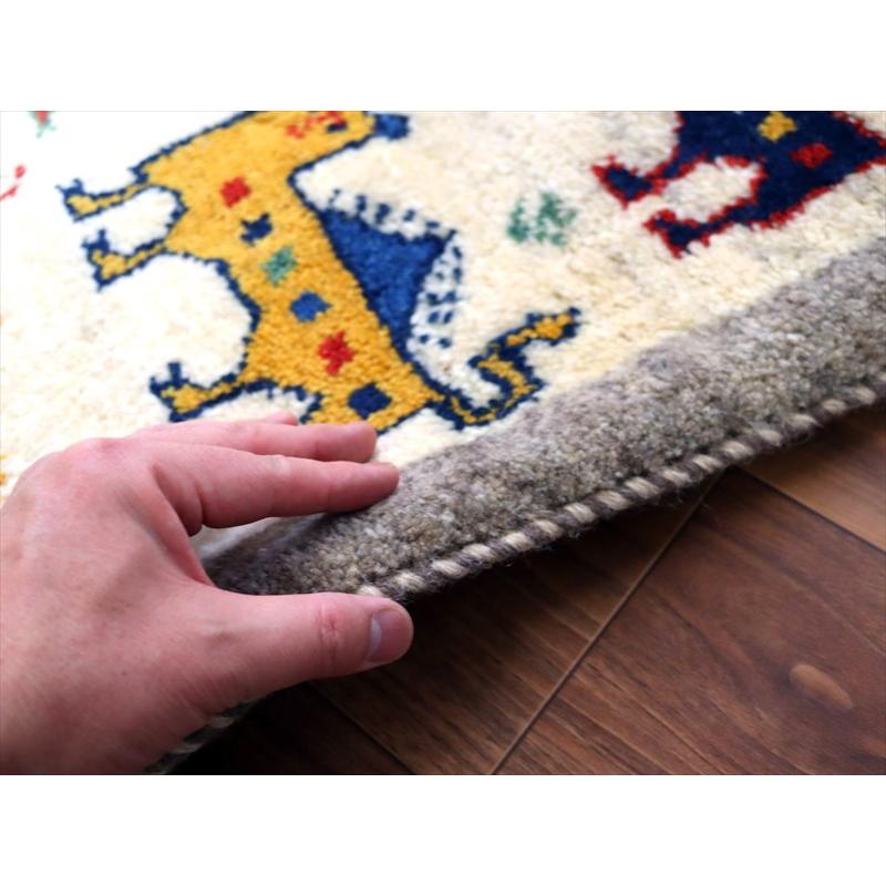 ギャッベ イラン産手織り 86×62cm 玄関マット ナチュラルアイボリー カラフルなライオン |  | 04