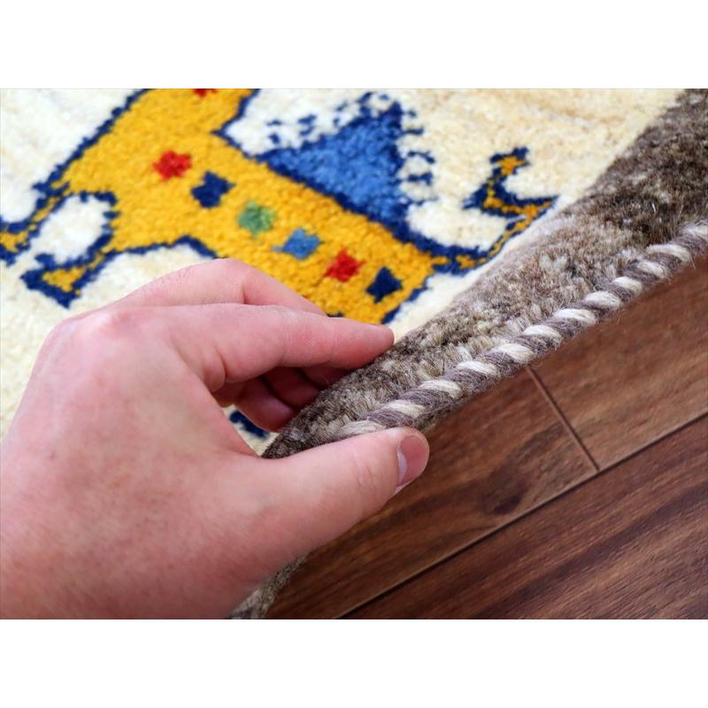 ギャッベ イラン産手織り 92×62cm 玄関マット ナチュラルアイボリー カラフルなライオン |  | 04