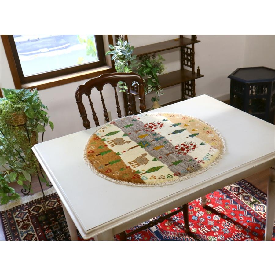 ギャッベ　円形　風景のギャッベ 60x60cm ラクダとザクロの木 |  | 06