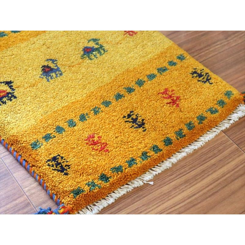 ギャッベ ミニギャベ イラン手織り 58×40cm イエローオレンジ ラクダのキャラバンと生命の樹 |  | 03