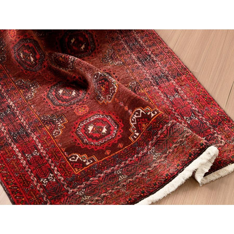 バルーチ族の絨毯 204x111cm 連なるギュル文様 バルーチ族の絨毯 204x111cm 連なるギュル文様
